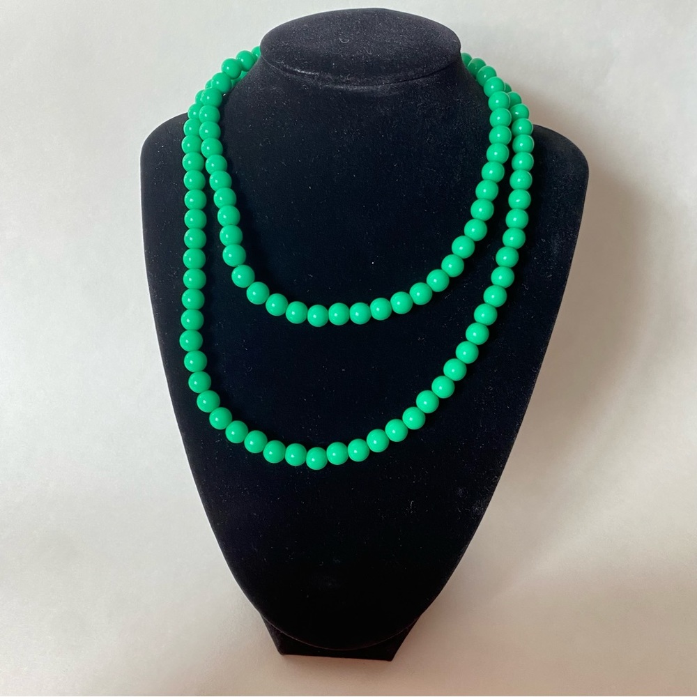 Green plastic beaded necklace